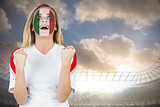 Excited italy fan in face paint cheering