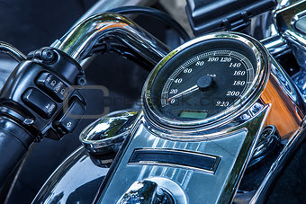 Motorcycle speedometer and handlebar.