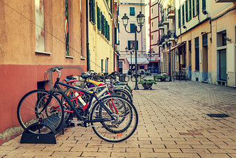 Bicycles in a row on the street of Ventimiglia.