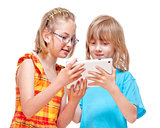 Two Children Having Fun with Digital Tablet 