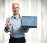 businessman showing laptop computer