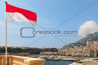 Monaco flag and Monte Carlo skyine.