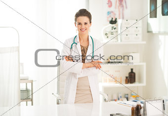 Portrait of smiling medical doctor woman in office