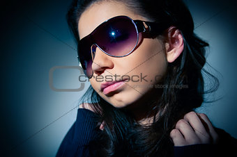 Portrait of a young girl in sunglasses