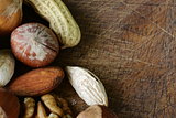Mix nuts on a wooden background macro shot