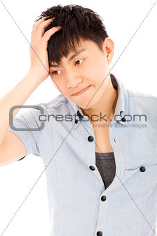 young man feel upset and holding his head