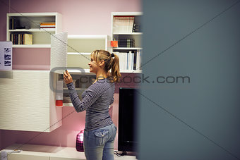 woman shopping for furniture and home decor