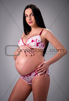 Lovely pregnant woman indoors