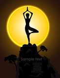 Silhouette of a girl in a yoga pose