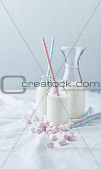 Bottles of Cold Milk and Marshmallows