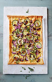 Rustic Zucchini and Onion Pizza with Mushrooms