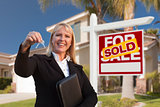 Female Real Estate Agent Handing Over the House Keys