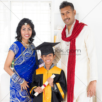 Parents and child on kinder graduate day