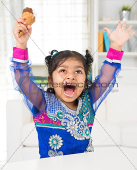 Happy girl eating ice cream. 