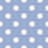 Seamless pattern or tile vector background with white polka dots on a pastel blue background.