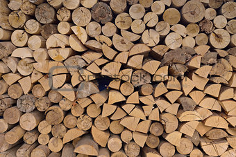 Wood chopped firewood stacked on the stack