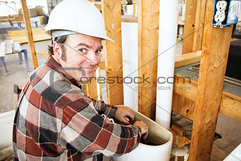 Plumber on Construction Site