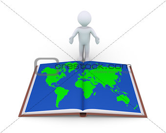 Person showing book with world map
