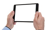 male hands holding a tablet touch computer gadget