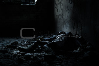 Dead woman lying in the basement