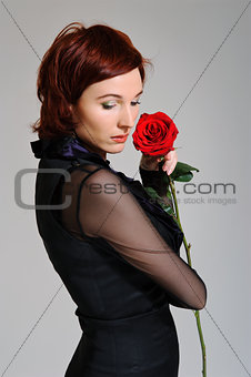 Pretty woman with rose 