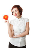 Beautiful woman with flower gerbera in her hands against white b