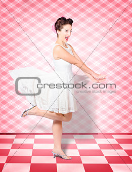 Attractive pinup woman running in surprise