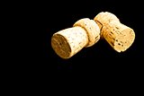 two cork on black background
