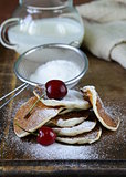 sweet dessert pancakes with powdered sugar for breakfast