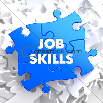 Job Skills Concept on Blue Puzzle.