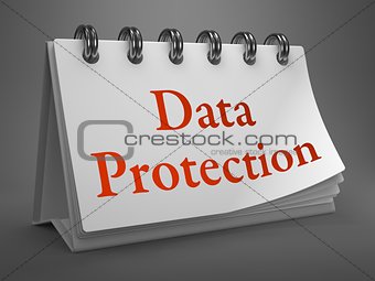 Data Protection -Red Words on Desktop Calendar.