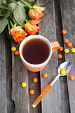 Cup of tea and colorful candies