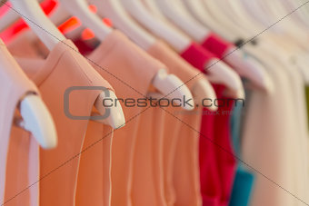 Dresses on clothes hangers