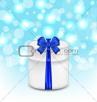 gift box with blue bow on glowing background