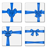 Set gift boxes with blue bows isolated on white background