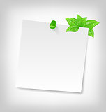 blank note paper with green leaves and space for your tex
