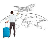 young businessman drawing airplane and world map