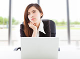 young business woman feel unhappy in the office