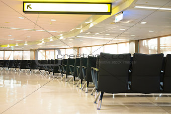  waiting room with empty chairs.