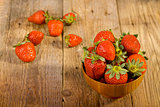 fresh strawberries in wood bowl 