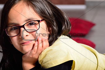 Girl with glasses posing