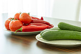 Tomato, cucumber, pepper on plate