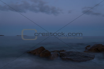 Twilight view of rocky ocean coast
