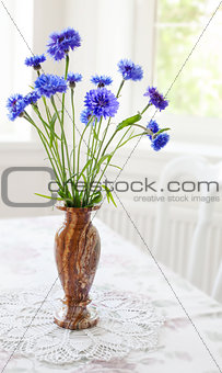 Spring bunch blue flower on table