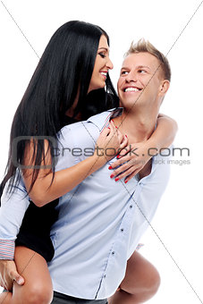 Sexy couple having a photo session in studio