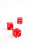 three red dice on white background