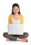 Asian girl using laptop pc