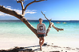Teen boy enjoying tropical beach  leisure vacation holiday