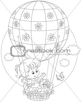 Child flying on a balloon