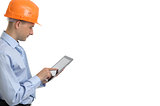 Young construction worker with digital tablet